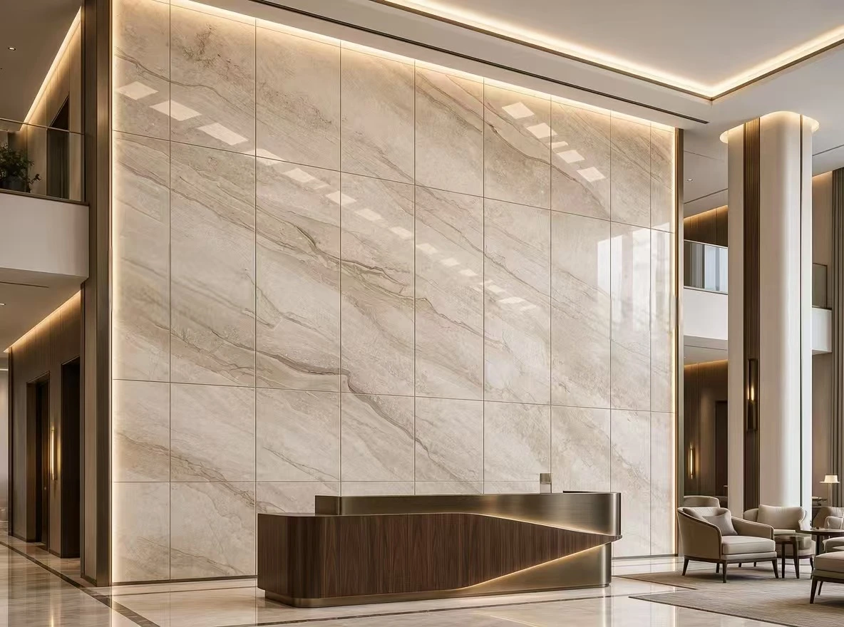 Daino Beige Marble wall tiles with visible joints forming a full-height feature wall in a luxury hotel lobby Daino Beige Marble wall tiles with visible joints forming a full-height feature wall in a luxury hotel lobby